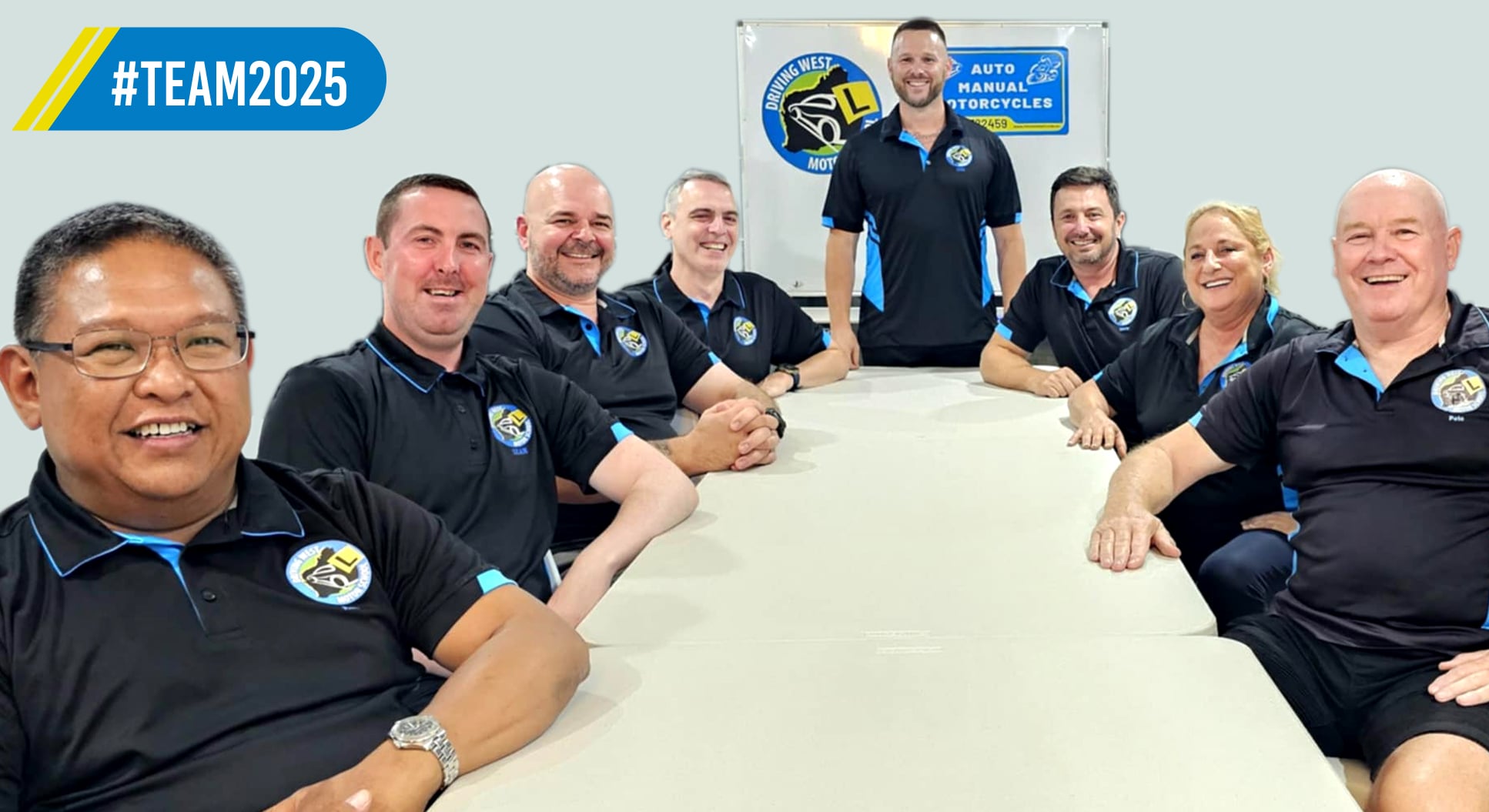 Driving West team meeting April 2025 Driving West team smiling together around a table at their April 2025 meeting