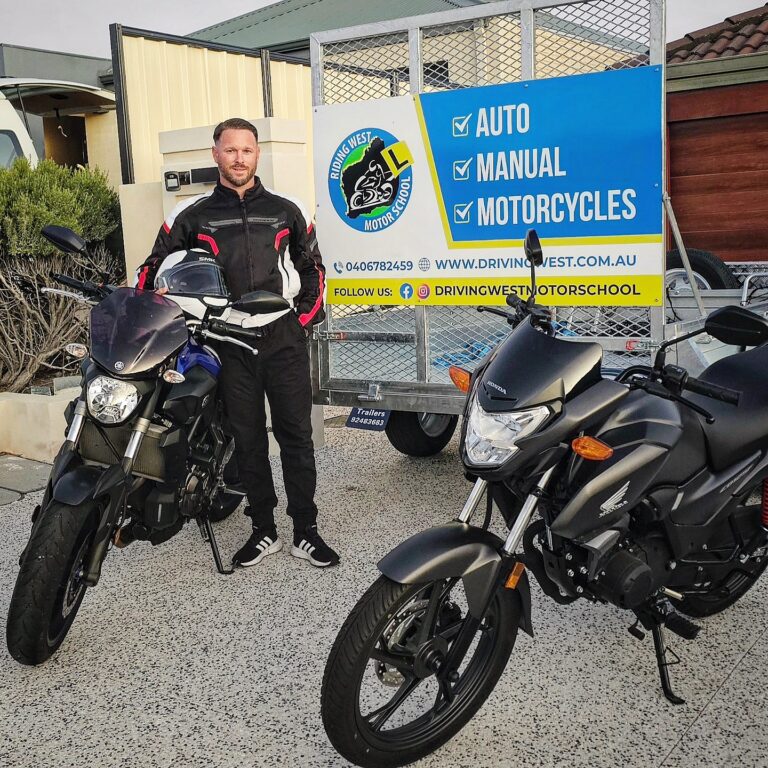 Dirk with motorcycles and the Riding West training trailer